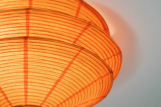 Transform Your Space with the Cozy Original Kami Shade - Amber
